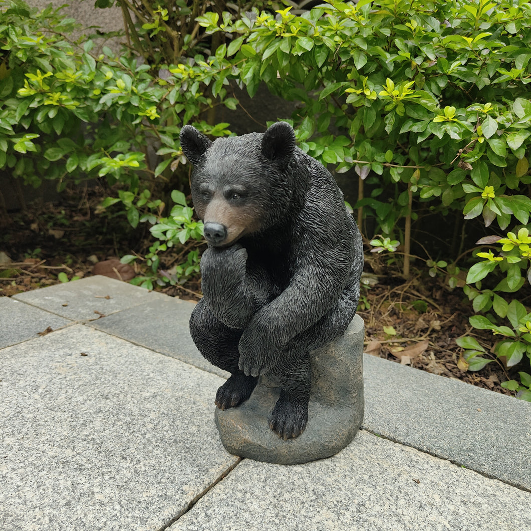 87957-Q - Onyx Contemplation: Intriguing Black Polyresin Thinking Bear Figurine