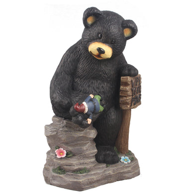 BEAR HOLDING SIGN AND GNOME