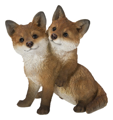 FOX PUPS HUGGING